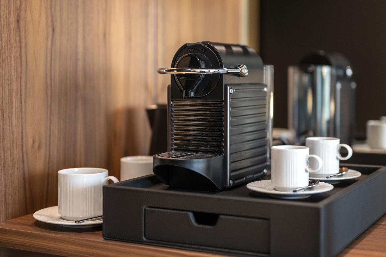 Renaissance Porto Lapa Hotel ภายนอก รูปภาพ A Nespresso coffee machine